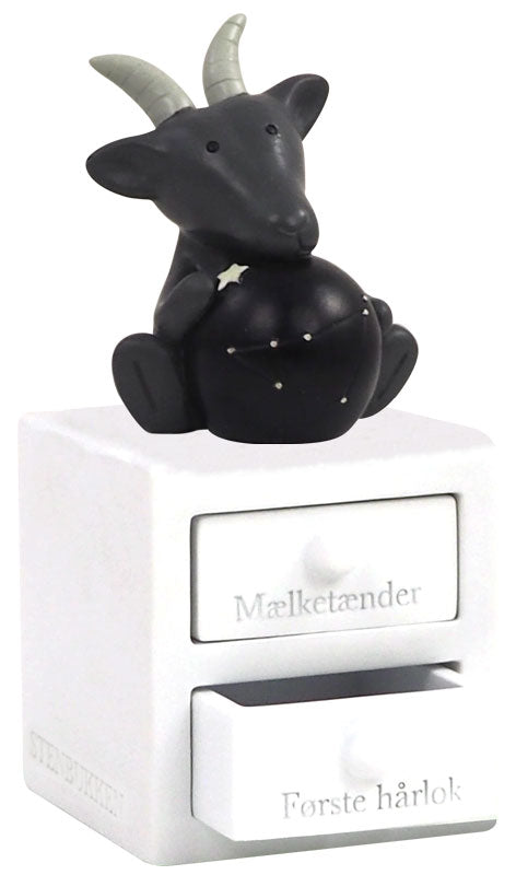 Tandæske og hårlok, "Stenbukken"