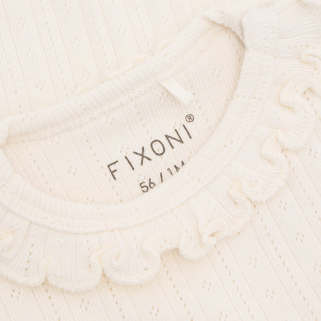 Fixoni - Creme body med flæsekant 423137