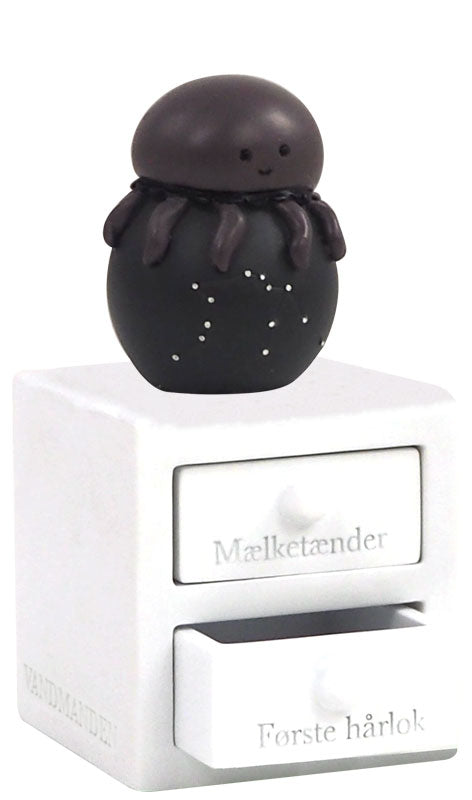 Tandæske og hårlok, "Vandmanden"