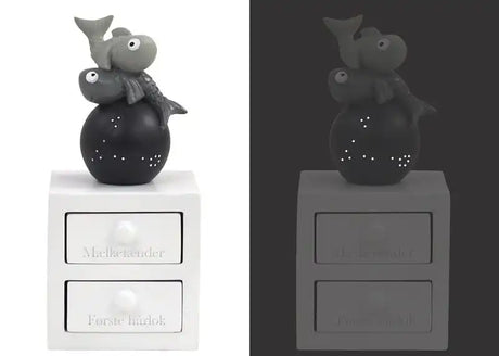 Tandæske og hårlok, "Fisken"